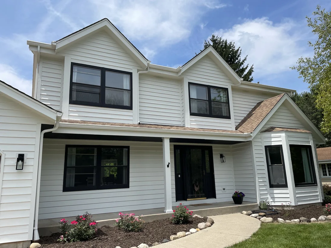 Exterior after white repaint with black accents